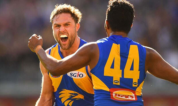 AFL 2018 Round 22 - West Coast v Melbourne PERTH, AUSTRALIA - AUGUST 19: Mark Hutchings of the Eagles celebrates a goal during the 2018 AFL round 22 match between the West Coast Eagles and the Melbourne Demons at Optus Stadium on August 19, 2018 in Perth, Australia. (Photo by Daniel Carson/AFL Media)